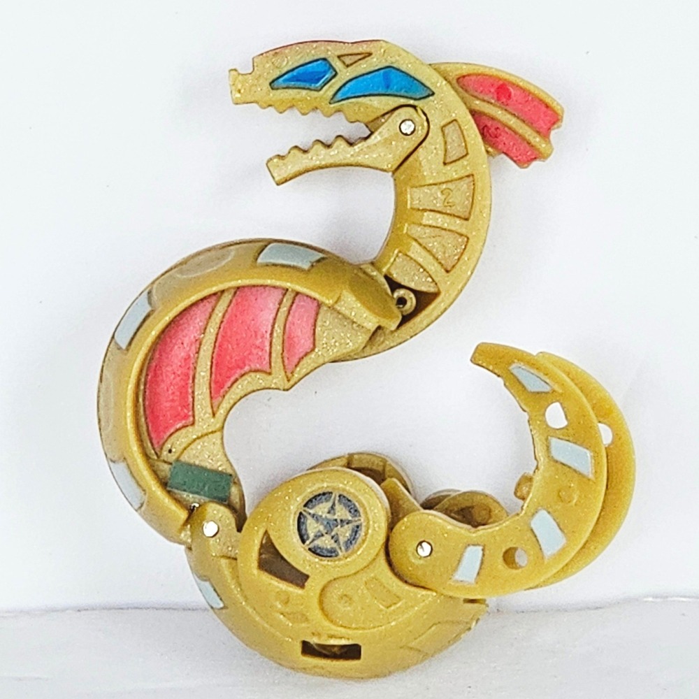 Y2K Bakugan Haos Serpenoid Gold Transforming Marble Action Figure Toy Vintage